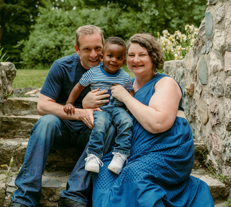 Stephanie and Mike sitting with Wyatt.